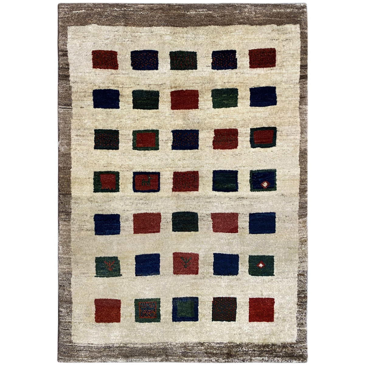 Gabbeh rug with a square pattern in blue, red, green, and beige, rectangular