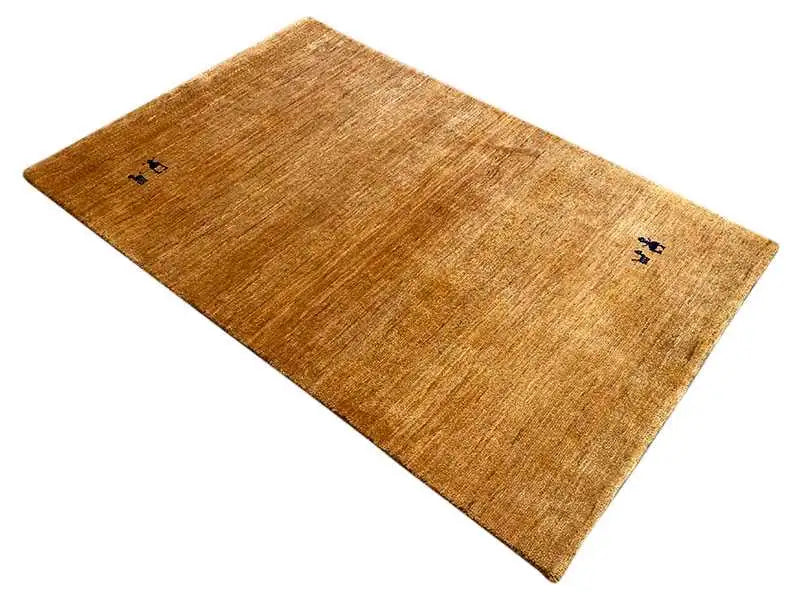 Gabbeh rug 150x100 cm, mustard brown, laid diagonally, blue-black animal motifs