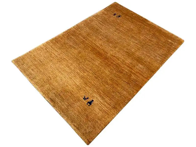 Gabbeh rug 150x100 cm, mustard brown, viewed from above, blue-black animal ornament