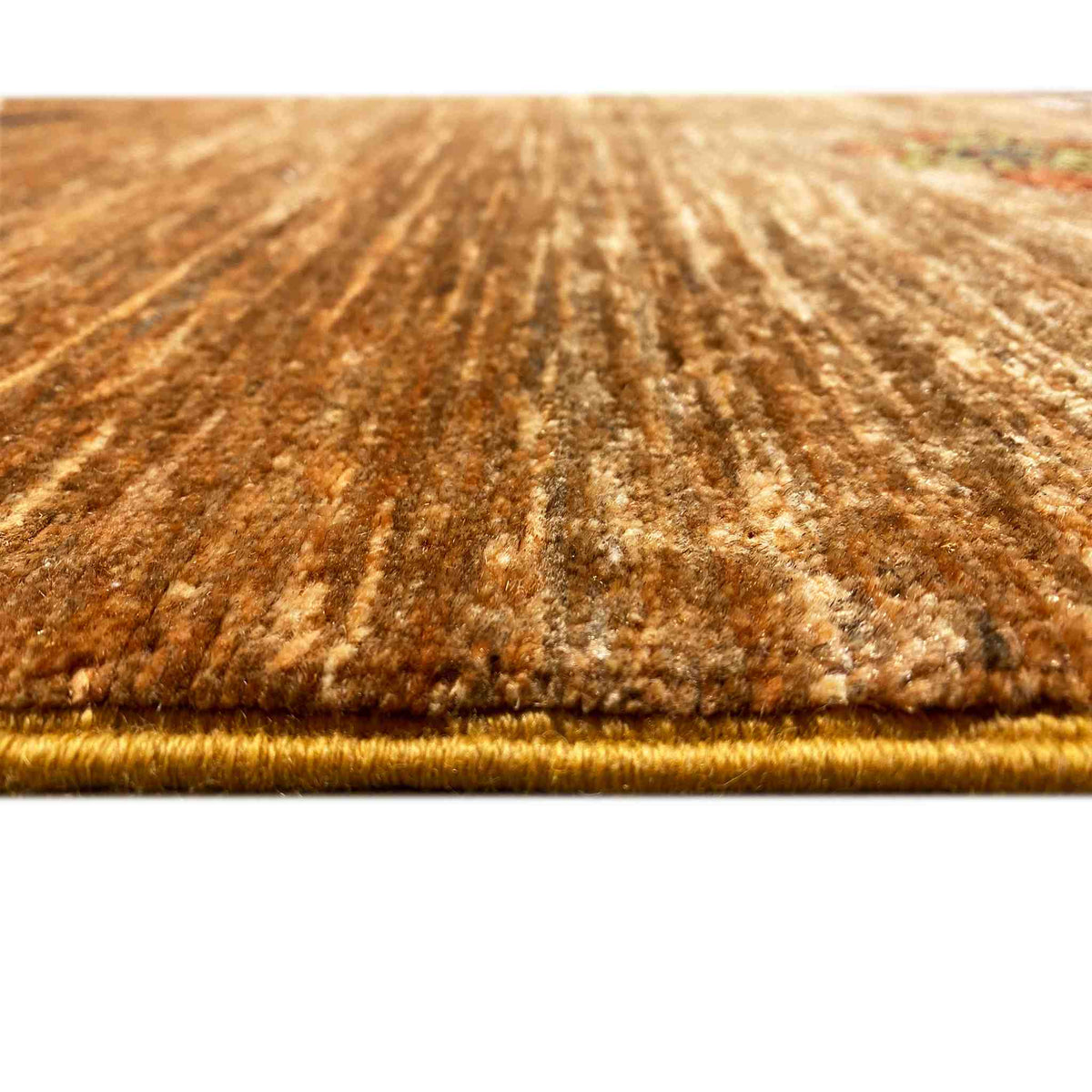 Close-up: Carpet pile in warm brown with subtle color gradients and a woven texture
