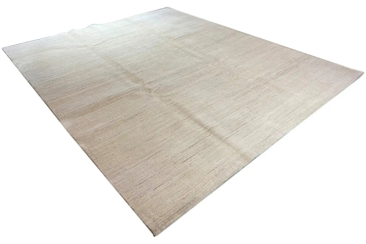 Light gabbeh rug with an even all-over pattern, diagonal close-up view