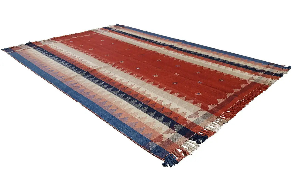 Oriental rug with a red central stripe and beige and blue sections, with fringes