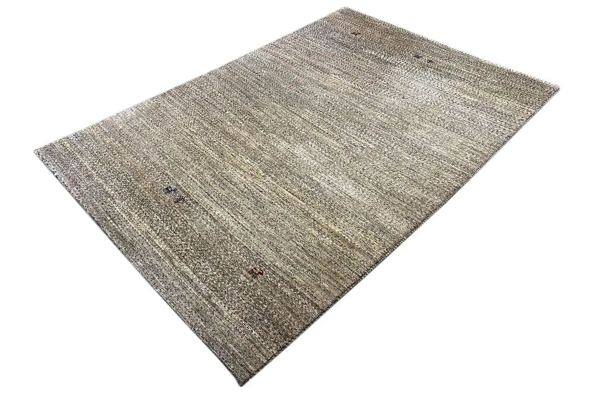 Beige-gray Gabbeh rug with fine lines and small color accents