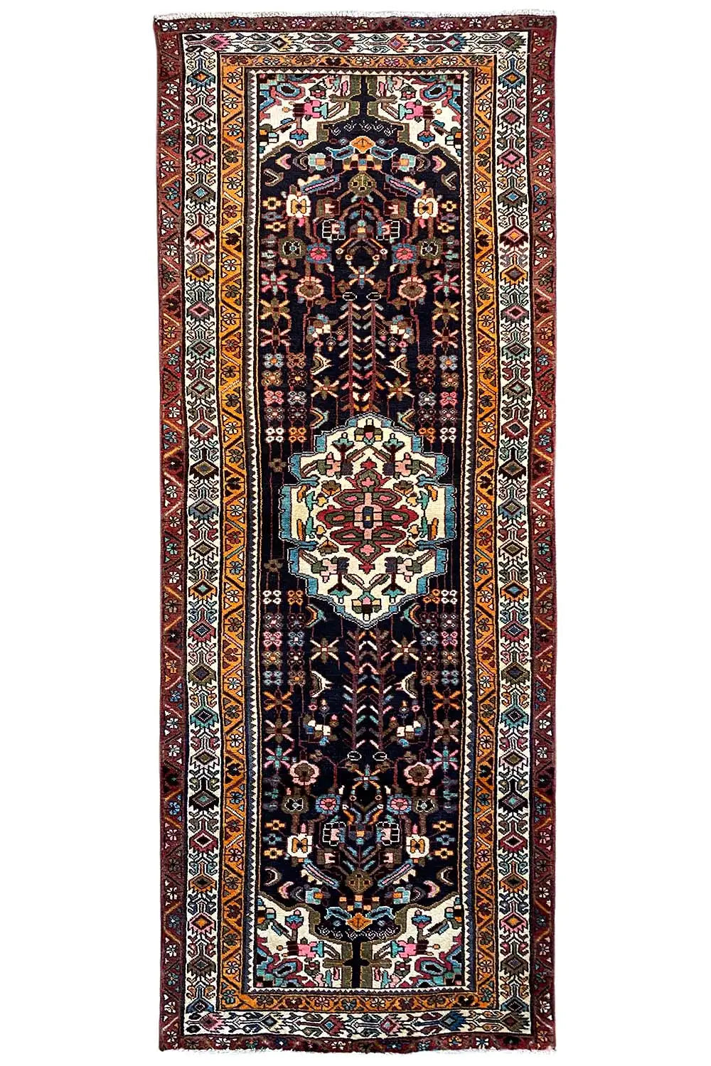 Rectangular Oriental rug runner with a dark background, a central medallion, and borders