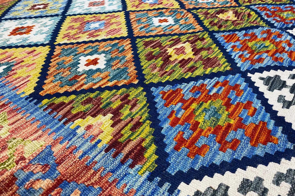 Kilim rug (Afghan) with multicolored geometric patterns, detail view