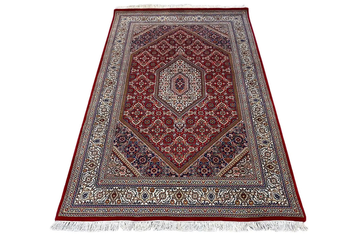 Carpet 186x123 cm with red medallion, gray-blue border, and fringes