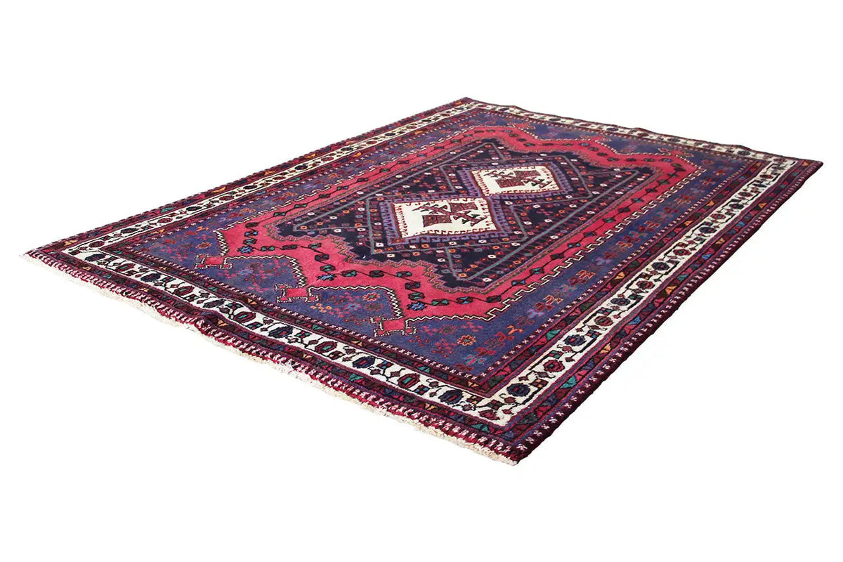 Sirjan carpet, colorful ornamentation with a central medallion and surrounding border