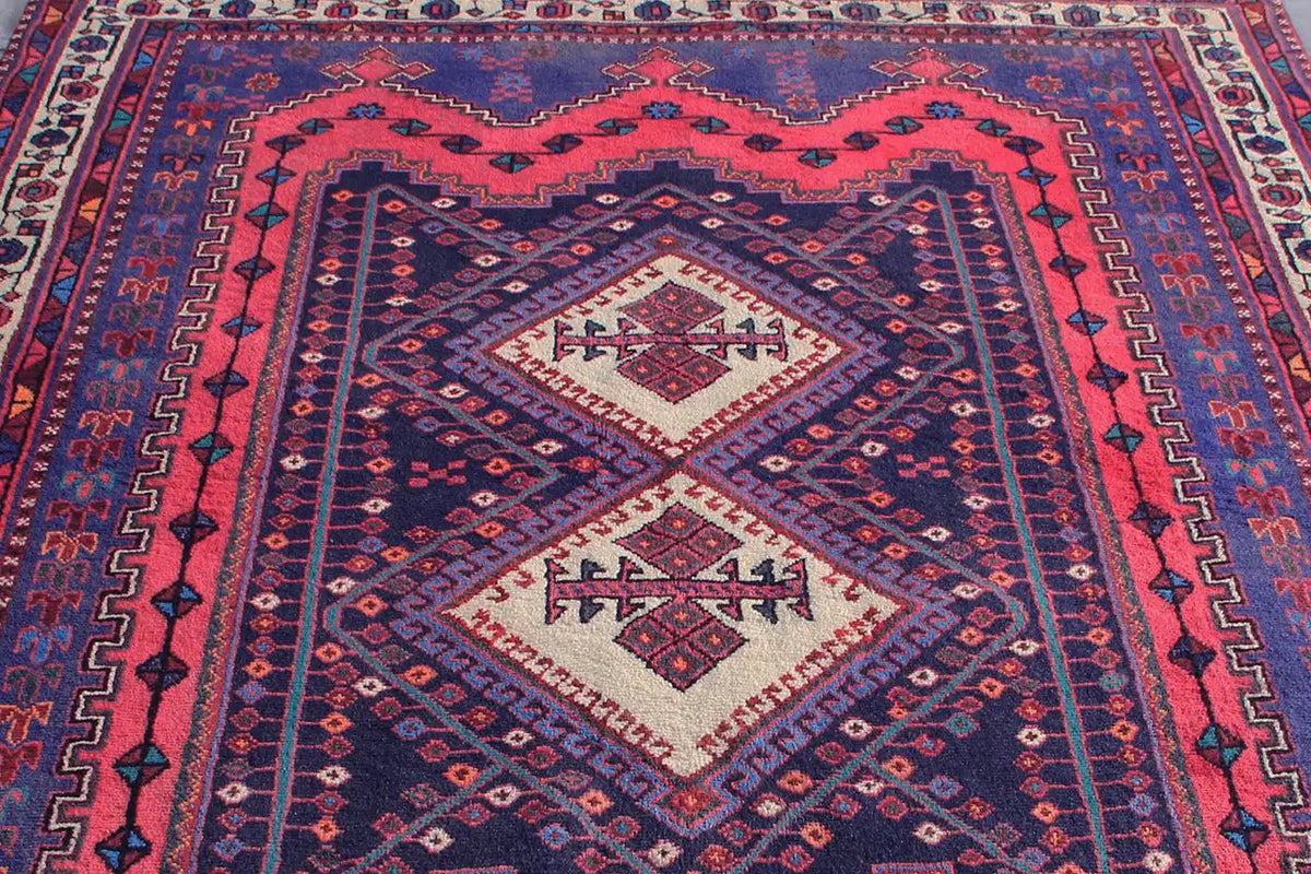 Sirjan carpet, close-up of the pattern: blue field with red zigzags and white diamonds