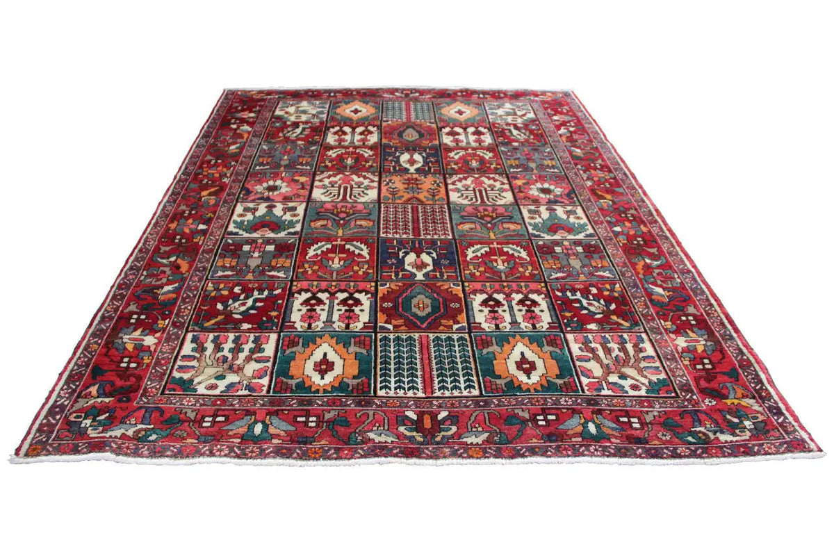 Oriental rug with a reddish-brown border and multicolored patchwork pattern, 315×220 cm