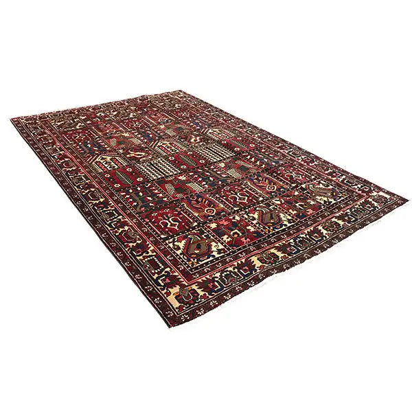 Bakhtiari oriental rug in Bordeaux with a geometric pattern and surrounding border