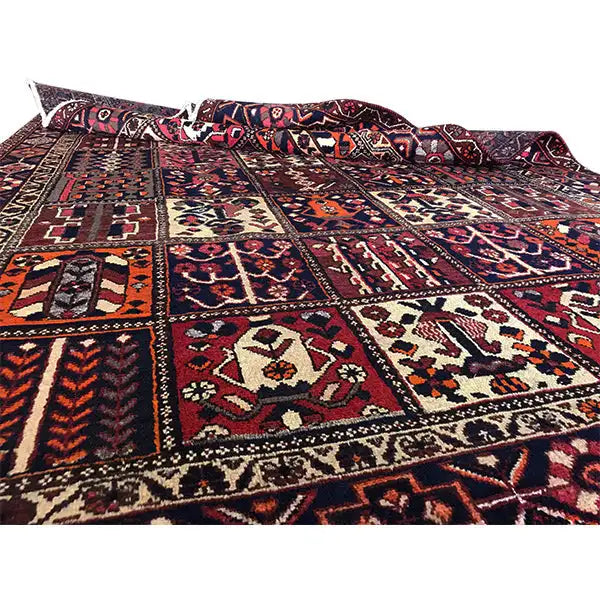 Rug 310x209 cm when laid out; bold geometric design in burgundy, blue, and orange