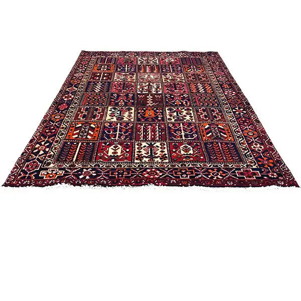 Rug 310x209 cm with centered pattern and border; colors burgundy, blue, beige