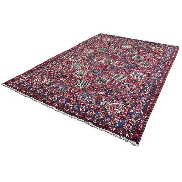 Bakhtiari rug (320x214 cm) with a border and colorful patchwork pattern, decorative edging.