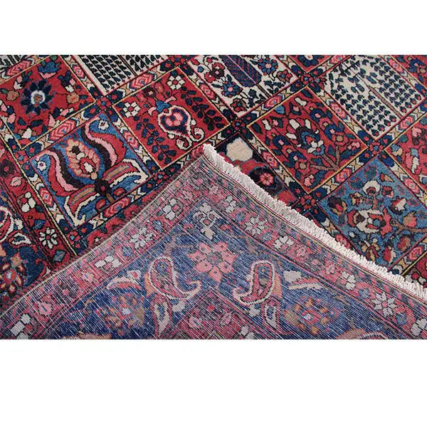 Bakhtiari rug (320x214 cm) Detail: woven pile texture, colorful diamonds and medallions.