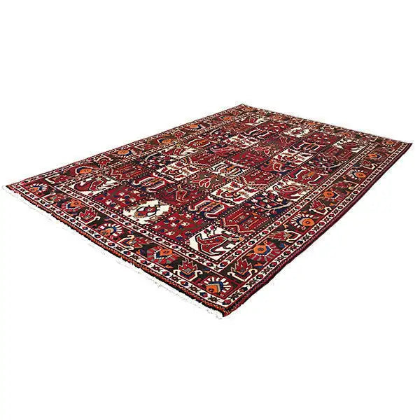 Bakhtiari rug (311x213 cm), laid flat, burgundy with white and dark blue ornaments