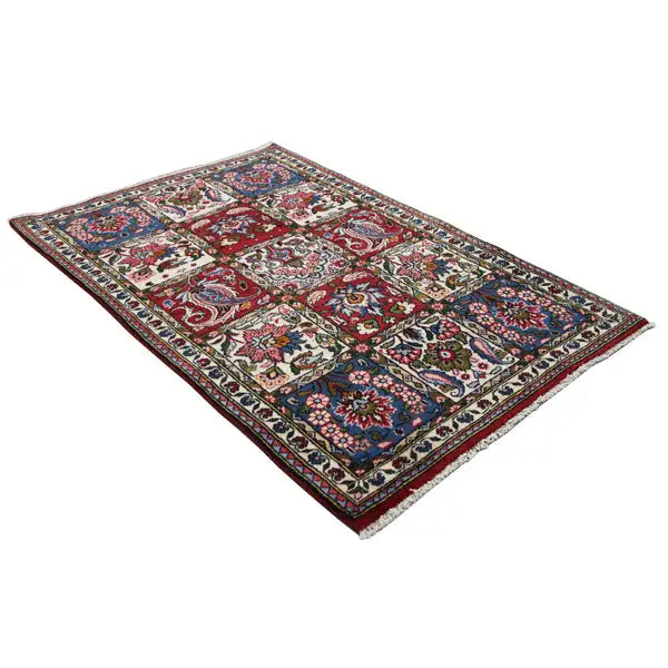 Bakhtiari rug 148x100 cm with patterned tiles, a dark blue border, and red accents