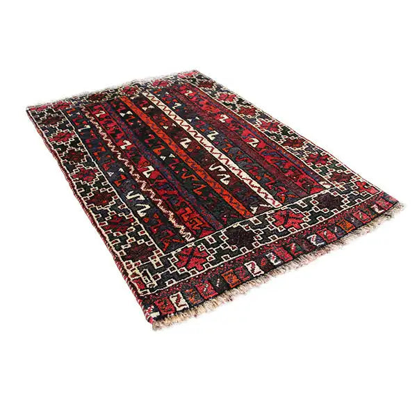 Rectangular oriental rug with a striped pattern and frayed fringes at the corners