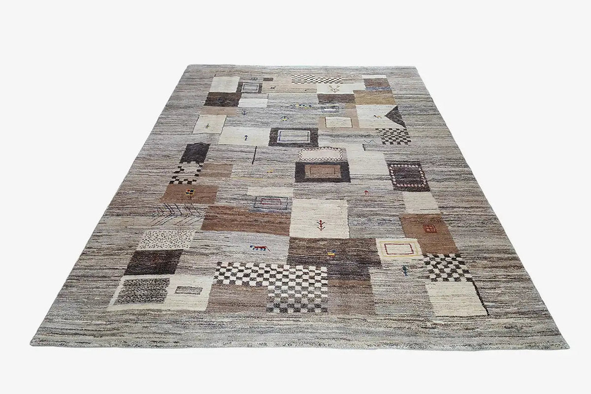 Rectangular Gabbeh rug with a large geometric patchwork pattern