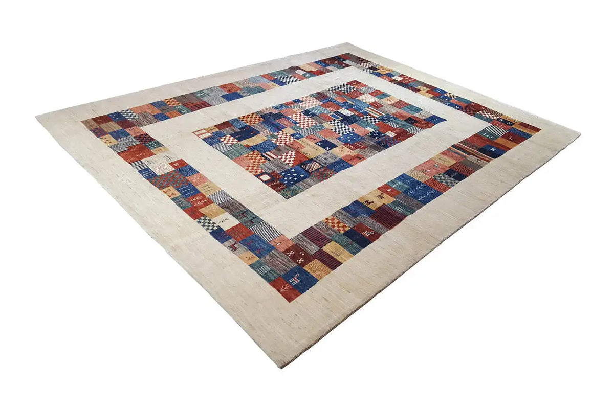 Pure wool rug with a centered patchwork medallion and wide border frame