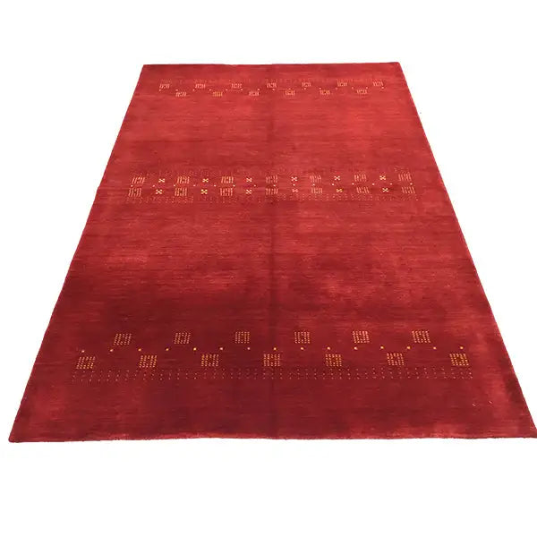 Reddish-brown Gabbeh rug with embossed gold geometric motifs, 245x170 cm