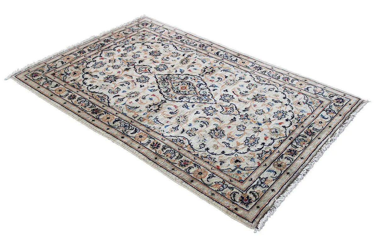 Keshan rug, beige base design with ornate blue and red motifs