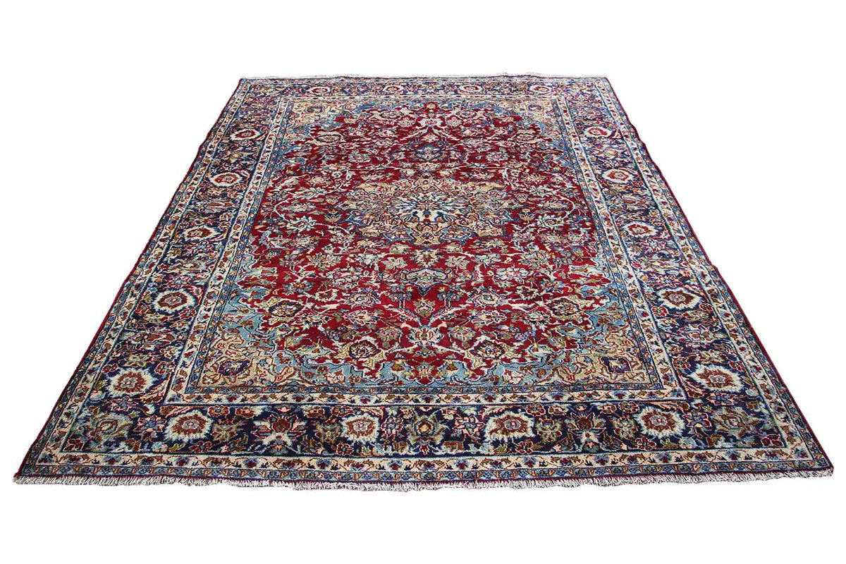 Rectangular red-and-blue patterned Oriental rug, laid flat (285x212 cm).