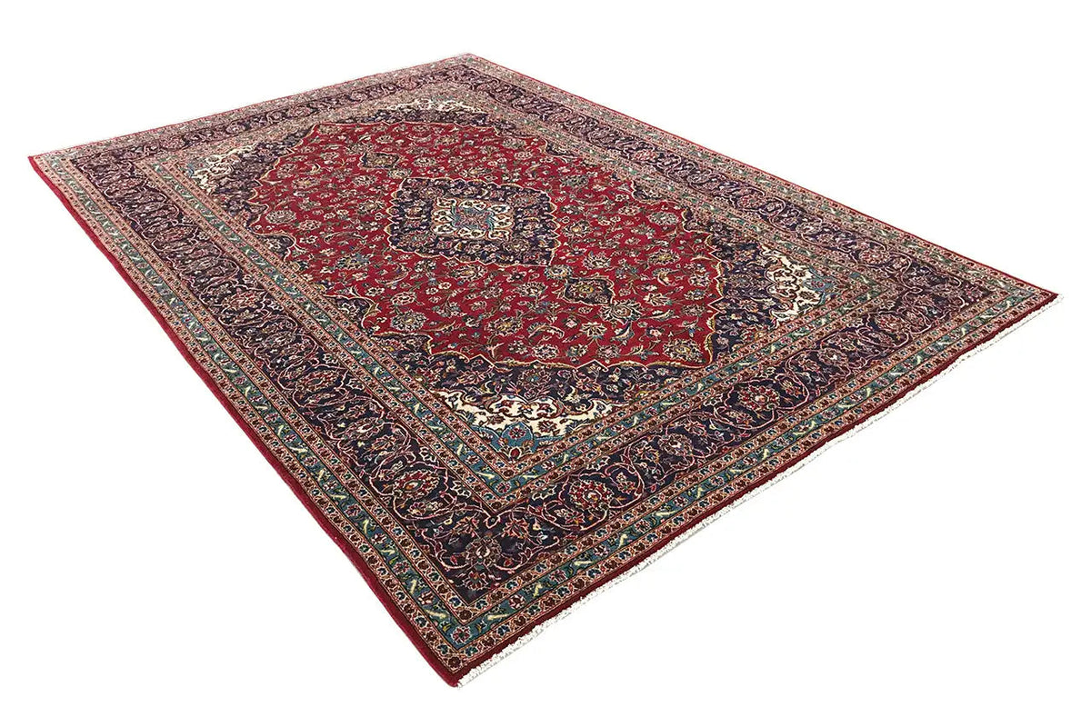 Keshan rug in red with detailed ornamentation and a wide border, 353x247 cm