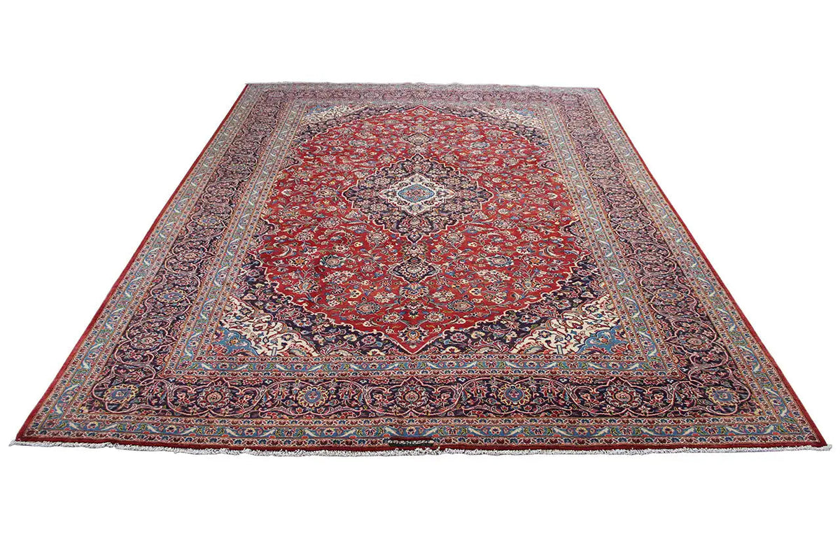 Keshan rug, red medallion with blue ornamental border, rectangular.