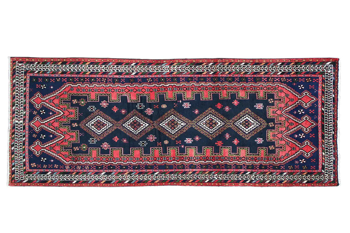 Sirjan runner, rectangular woven rug with a geometric pattern in dark blue and red