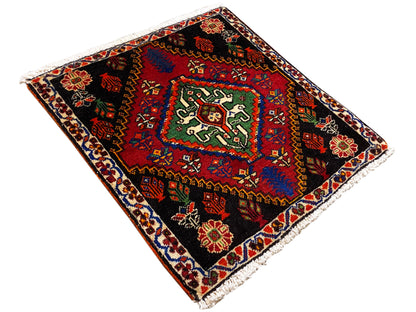 Poshti rug 56x56 cm, laid diagonally, geometric patterns in red, green, and blue