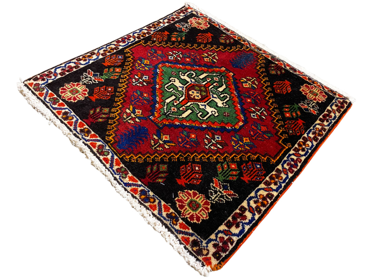 Poshti rug 56x56 cm, square, red border with colorful small details on black