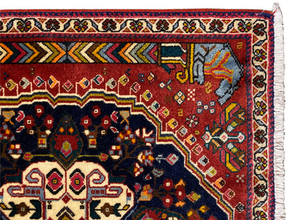 Poshti rug border detail with red, blue, and yellow ornaments