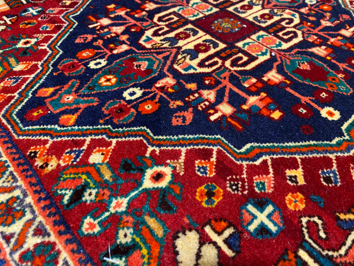 Poshti rug 64x64 cm, close-up of ornamental fields in dark blue, burgundy red and turquoise