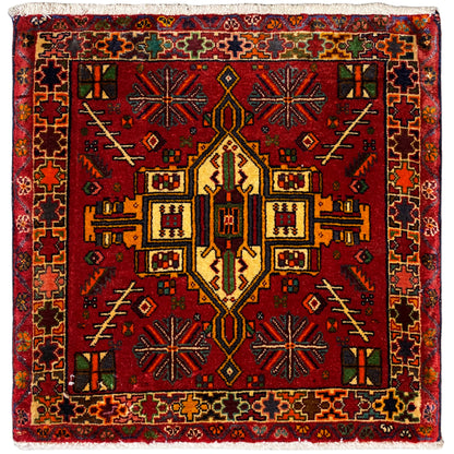 Poshti rug with a red, multicolored ornamental pattern and brown border, rectangular