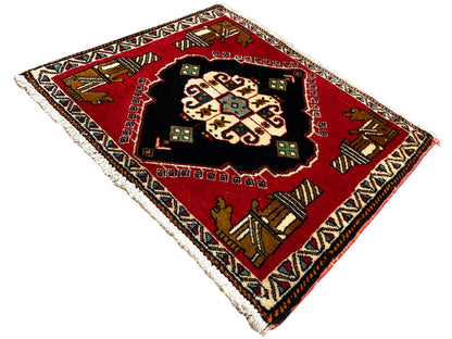 Poshti rug 63x55 cm: red rug with a black medallion, colorful corner motifs, fringes