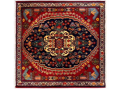 Square rug 67x60 cm, red field with a dark blue medallion and ornaments