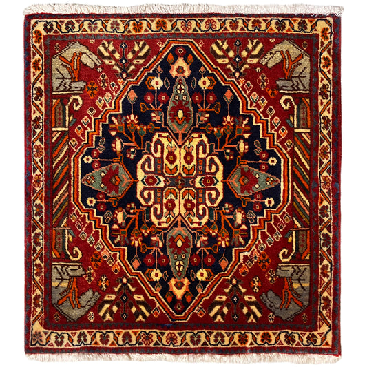 Carpet 65x59 cm with red and blue medallion, ornamental patterns, and fringe