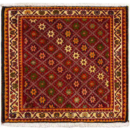 Poshti rug, rectangular, multicolored with ornamental star patterns and a fringed edge.