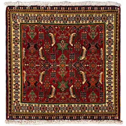 Poshti rug 63x61 cm with a red and green pattern, with fringes along the edge.