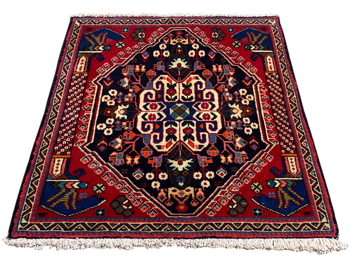 Poshti rug 66x63 cm, dark blue/red, medallion pattern with fringes along the edge