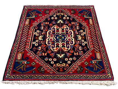 Poshti rug 66x63 cm, dark blue/red, medallion pattern with fringes along the edge