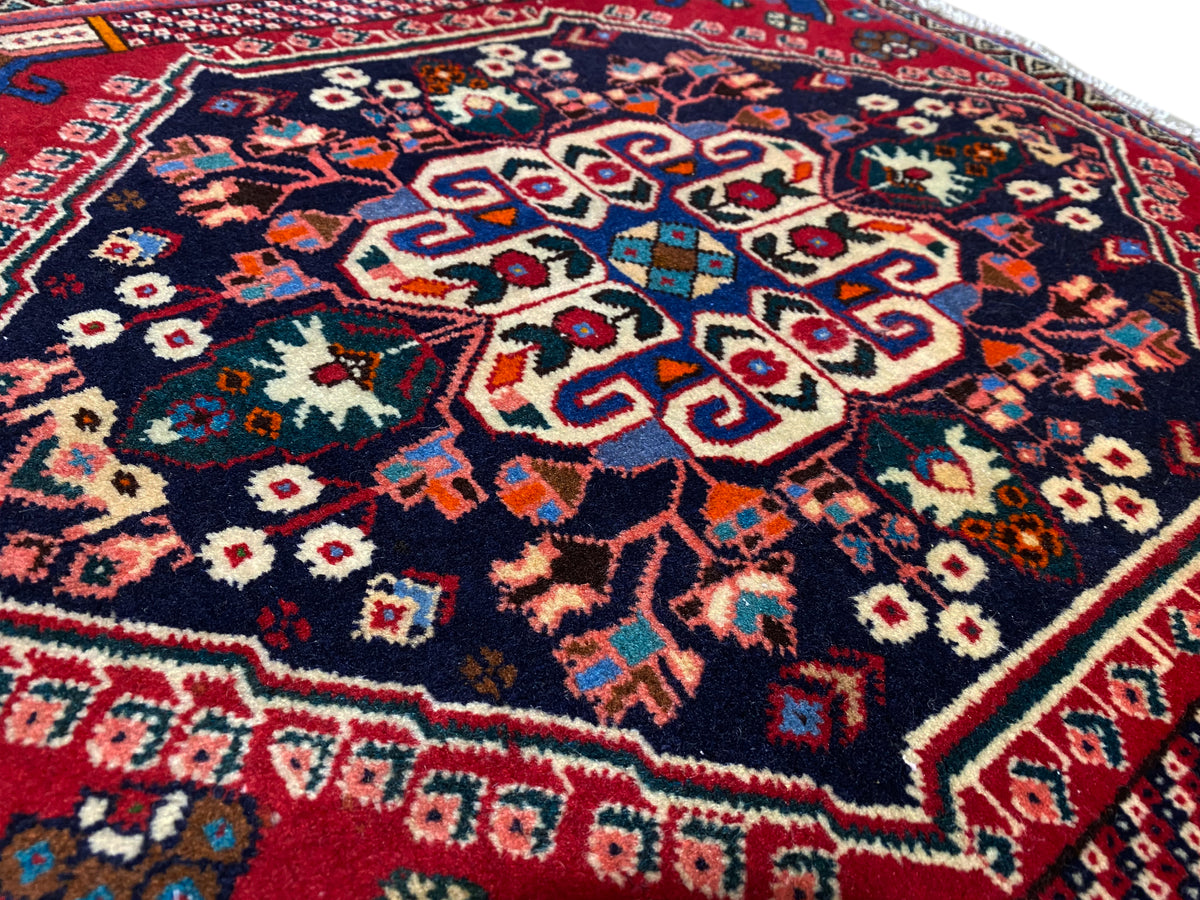 Poshti rug 66x63 cm close-up: central ornament, colorful stars and diamonds