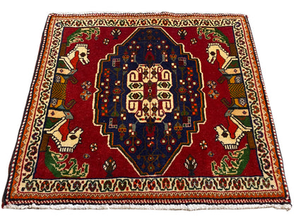Square Poshti rug, red ground, blue central medallion and multicolored border