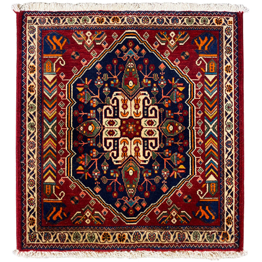 Rug 63x60 cm with a blue and burgundy medallion pattern and fringes