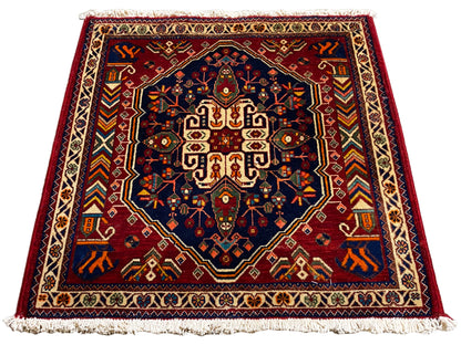 Carpet 63x60 cm, rectangular, dark blue center with a colorful ornamental border