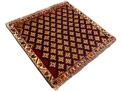 Poshti rug 61x59 cm: square, photographed diagonally, geometric pattern, fringes at the corners