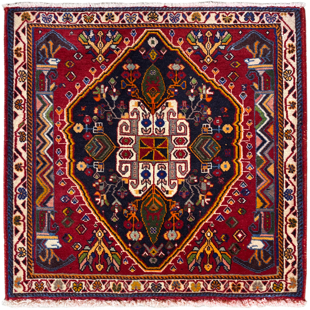 Poshti rug (67×67 cm) with a dark background, border, and geometric medallion