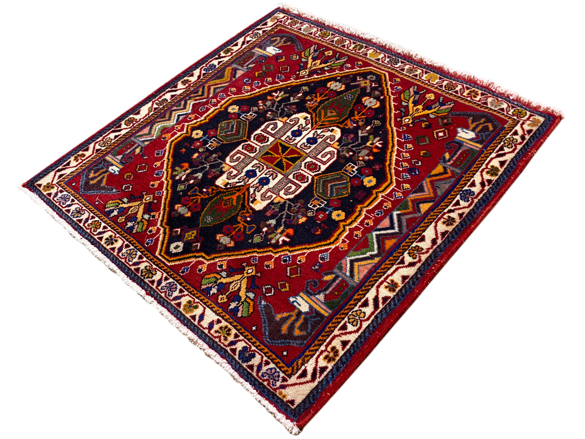 Poshti rug (67×67 cm), diagonal: reddish-brown border, blue field with ornaments