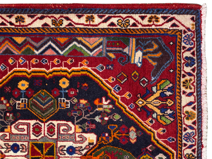 Poshti rug: close-up of the border with zigzag and floral ornaments