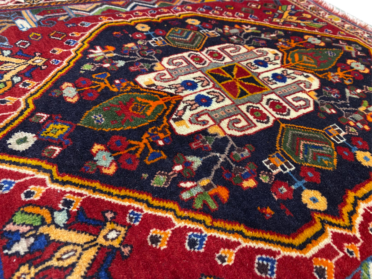 Poshti carpet: Detail of the center with geometric pattern fields and diamonds